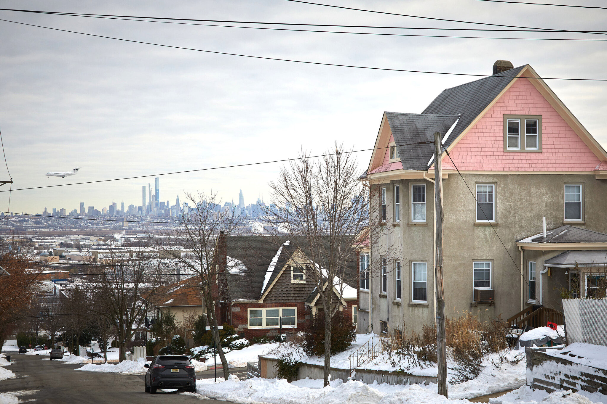 A Wood-Ridge residential street with the New York City skyline in the distance